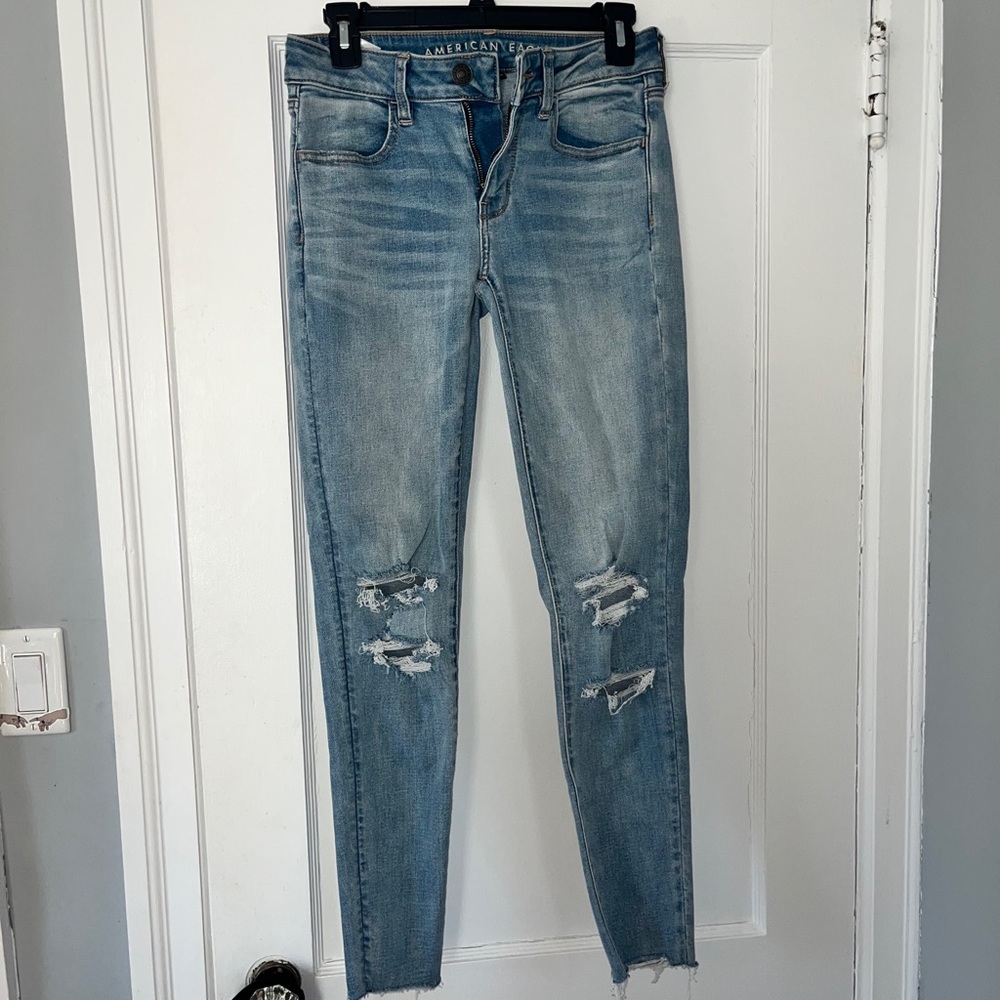 AMERICAN EAGLE ripped low rise skinny jeans